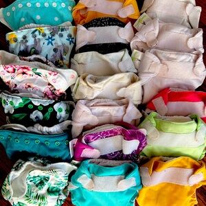 Batch of 19 newborn size Velcro all-in-one cloth diapers